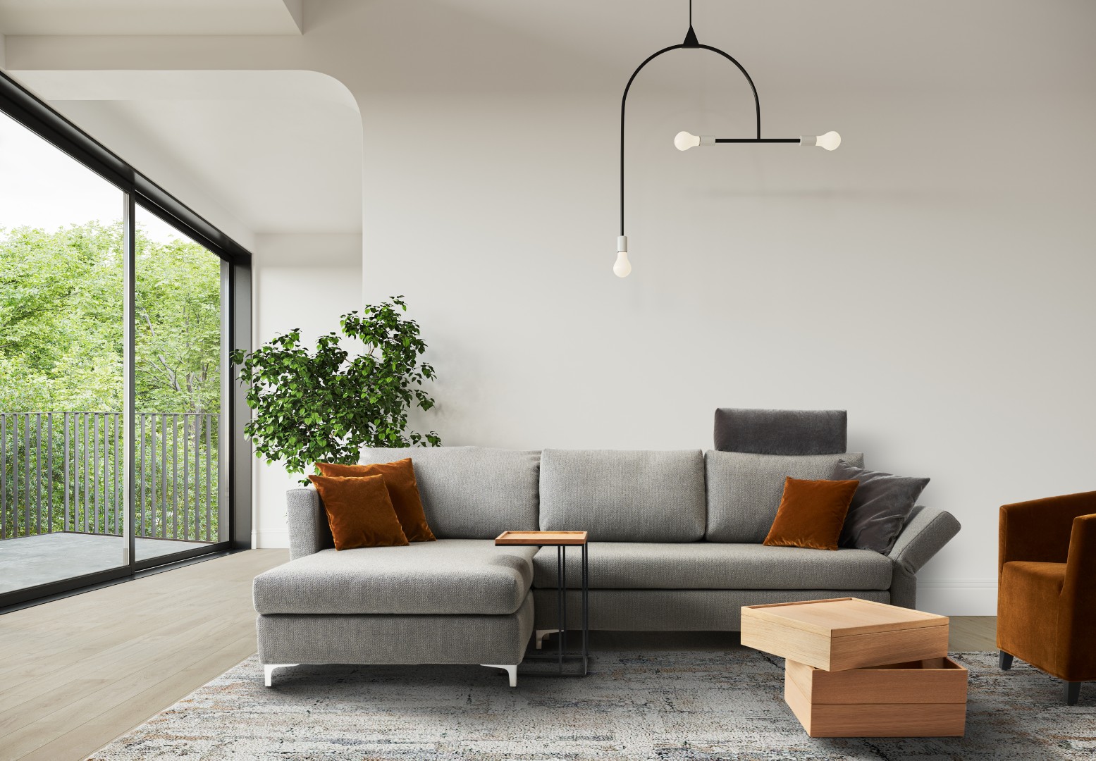 Graues Signet-Schlafsofa  auf hellem Teppich vor einer großen Fensterfront mit Beistelltisch und Sessel